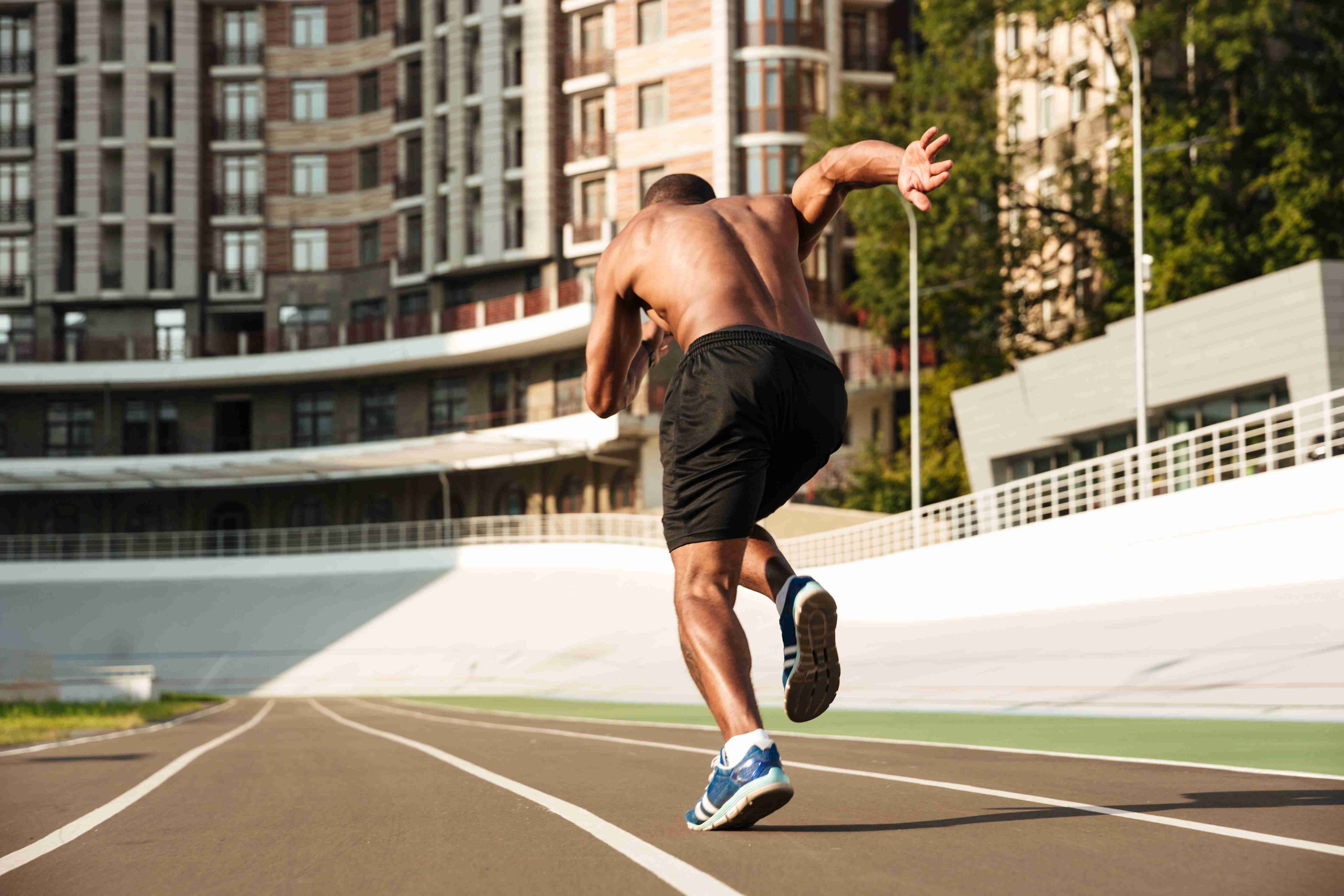 Sprinter running in track.