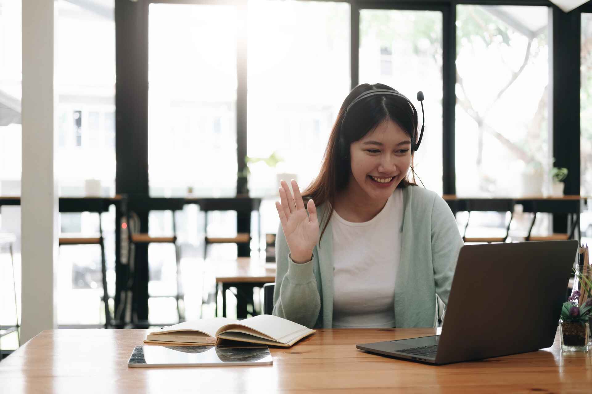 Asian lady having e-learning online course.